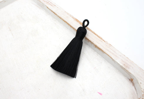 black tassel, silky nylon, 2 inches, sold as 1 piece.